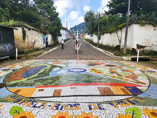 Apaneca Mural Colourful tile mural in a street.